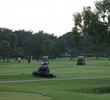 Maintenance crews work on No. 18 at Bardmoor Golf and Tennis Club in Largo, Fla.