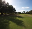 The ninth hole at Pebble Creek Golf Club is a dogleg-left par 4.