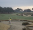 The par-5 fourth hole on the Pine Barrens course at the World Woods Golf Club is loaded with waste bunkers from tee to green.