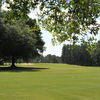 View from the 10th fairway at Pebble Creek - #10 is A dogleg left par 4. Favors a tee shot down the right side of the fairway to avoid being blocked out by trees. 